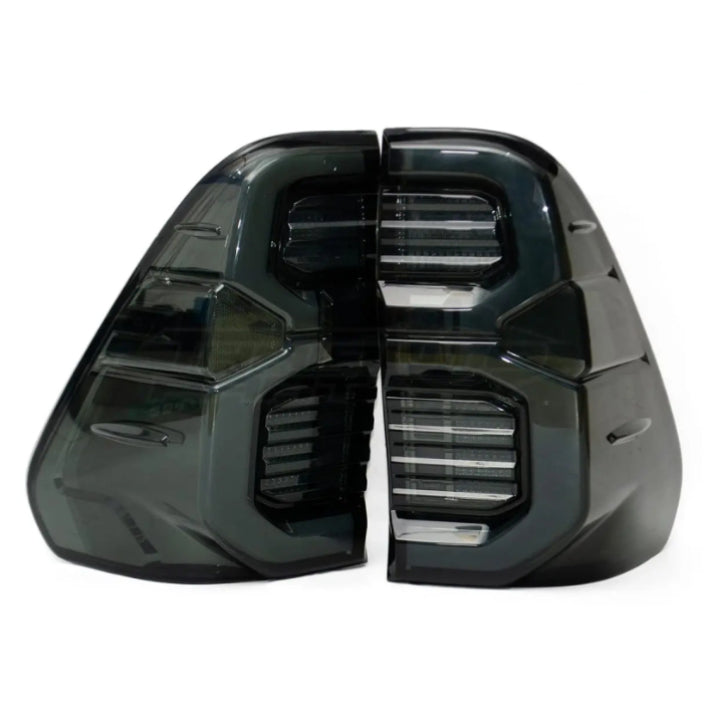 Toyota Hilux 2016+ Tail Lights Set Smoked With GR Logo