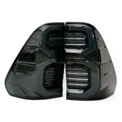 Toyota Hilux 2016+ Tail Lights Set Smoked With GR Logo