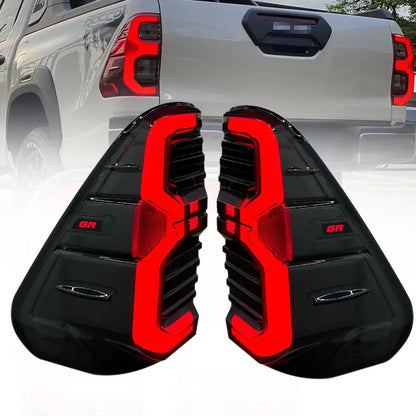 Toyota Hilux 2016+ Tail Lights Set Smoked With GR Logo