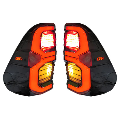 Toyota Hilux 2016+ Tail Lights Set Smoked With GR Logo