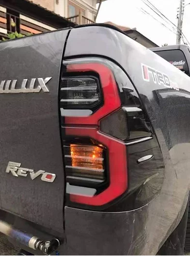 Toyota Hilux 2016+ Tail Lights Set Smoked With GR Logo