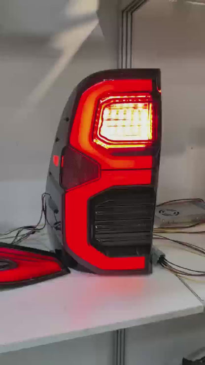 Toyota Hilux 2016+ Tail Lights Set Smoked With GR Logo
